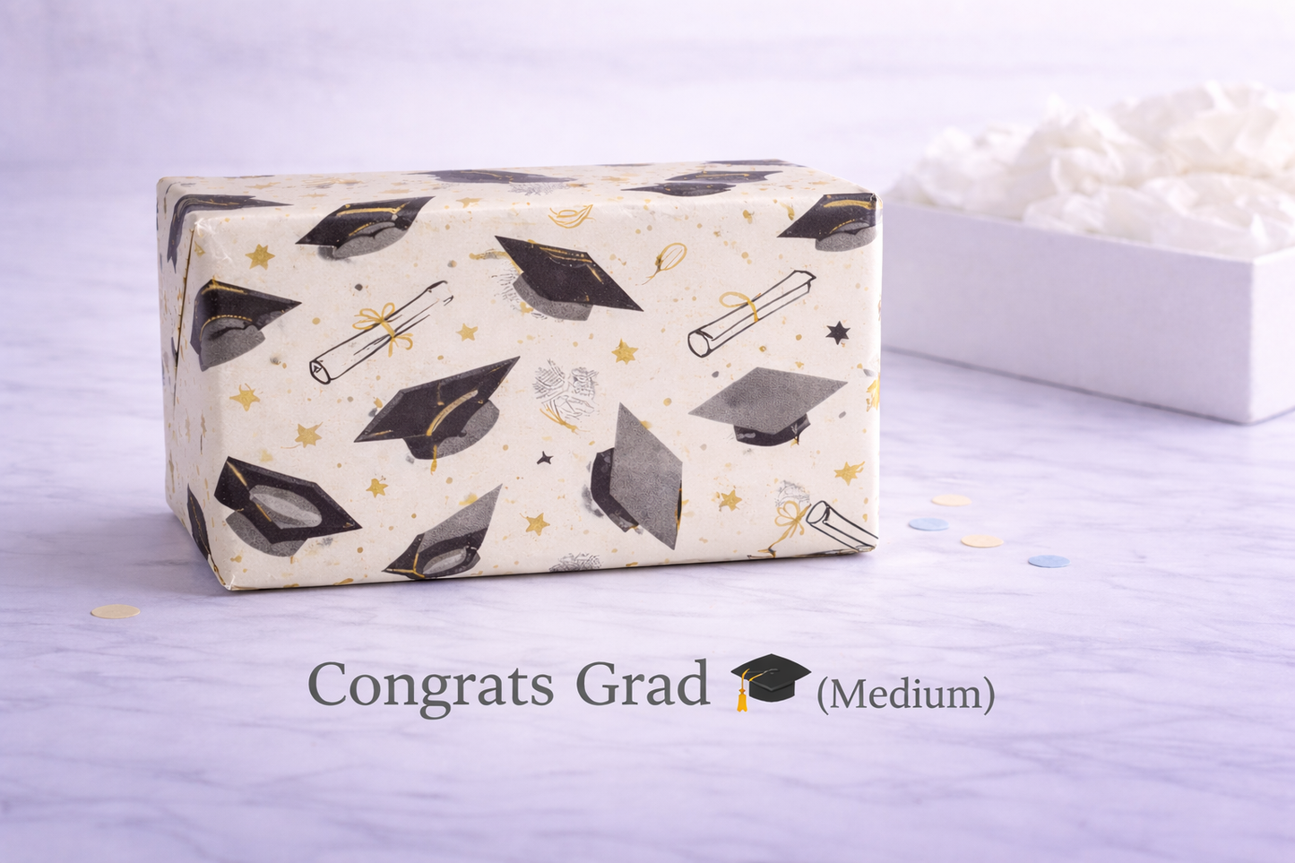 medium Graduation-themed gift box with decorative elements on a light background