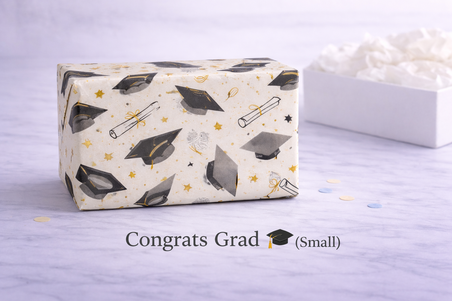 small Graduation-themed gift box with 'Congrats Grad' text on a light purple background