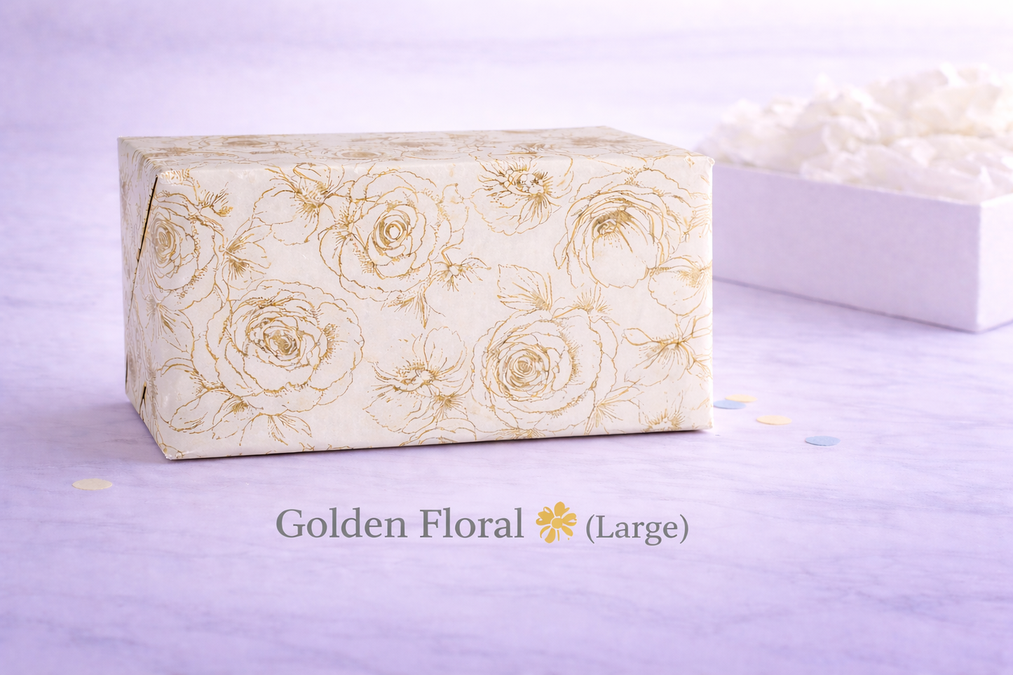 Large rectangular box with gold floral pattern on a light purple background